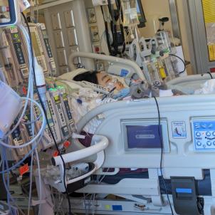 Young boy with light skin tone lying in surgical bed